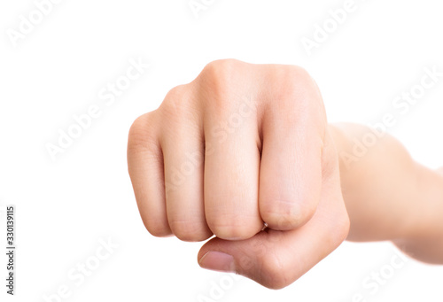 Close up of a female fist punching the camera