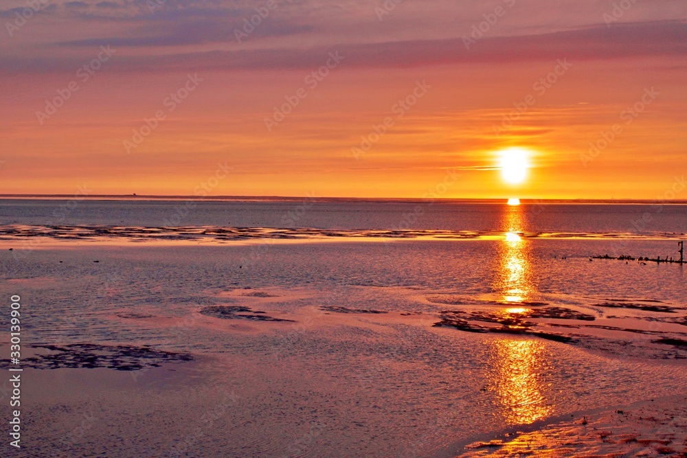 Obraz premium Sonnenuntergang an der Nordsee