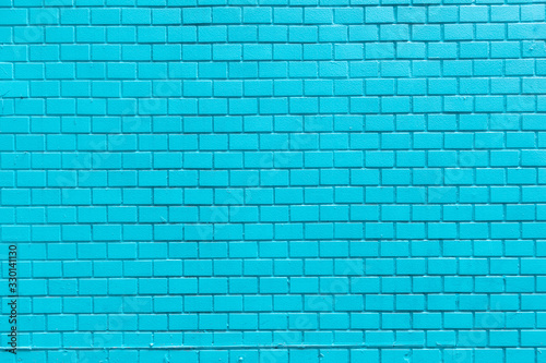 Blue brick wall background.