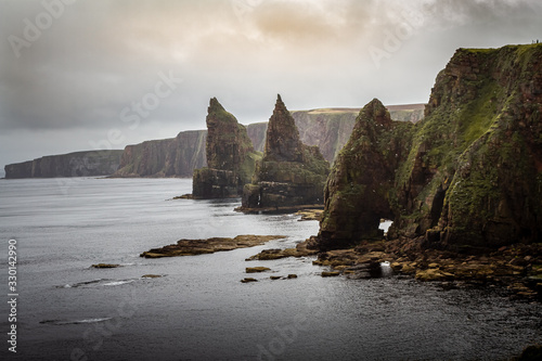 Gorgeous moody view of Duncansby Head on the NC500 route in Northern Scotland.