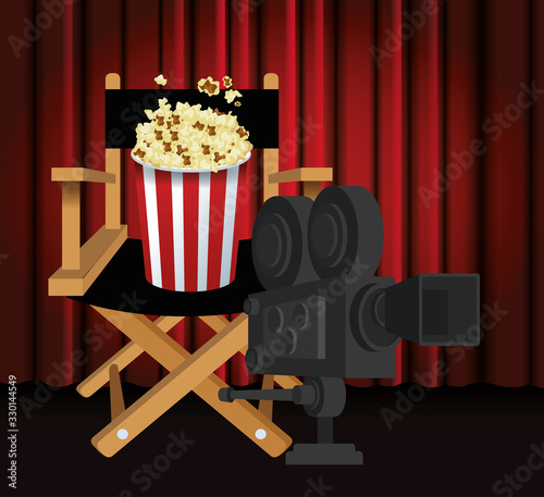 directors chair with popcorn bucket and film camera