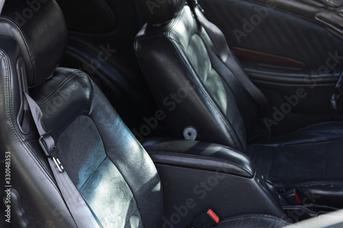 black leather car seats, combination leather. © velimir