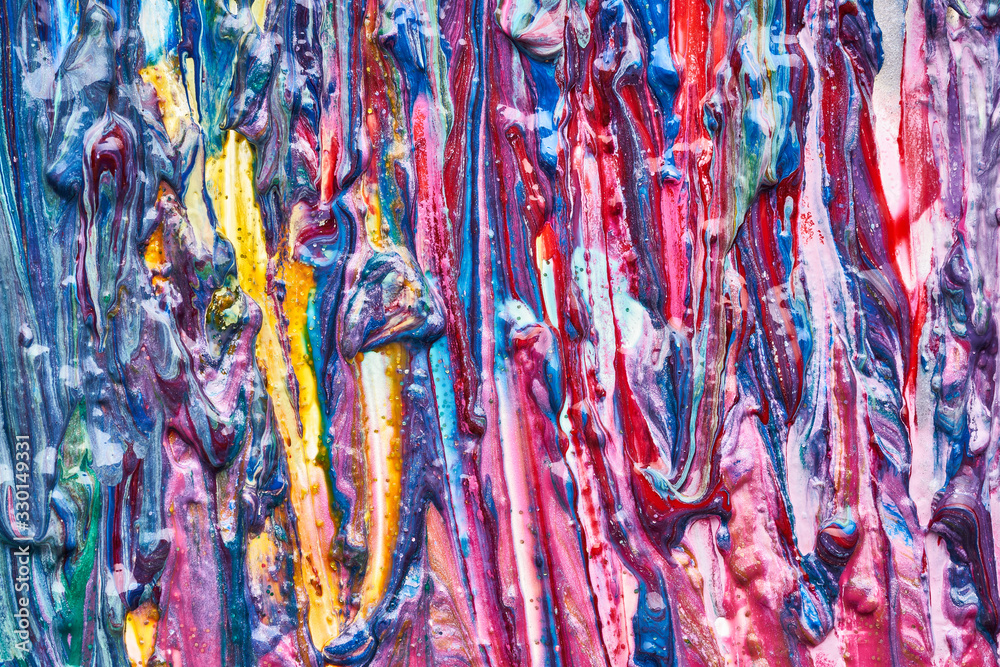 Texture and strokes of multicolored acrylic paint with sparkles on a white background