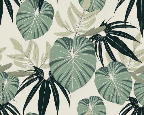 Seamless tropical pattern with colorful leaves and plants. Seamless exotic pattern with tropical plants. Exotic wallpaper. Trendy summer Hawaii print.