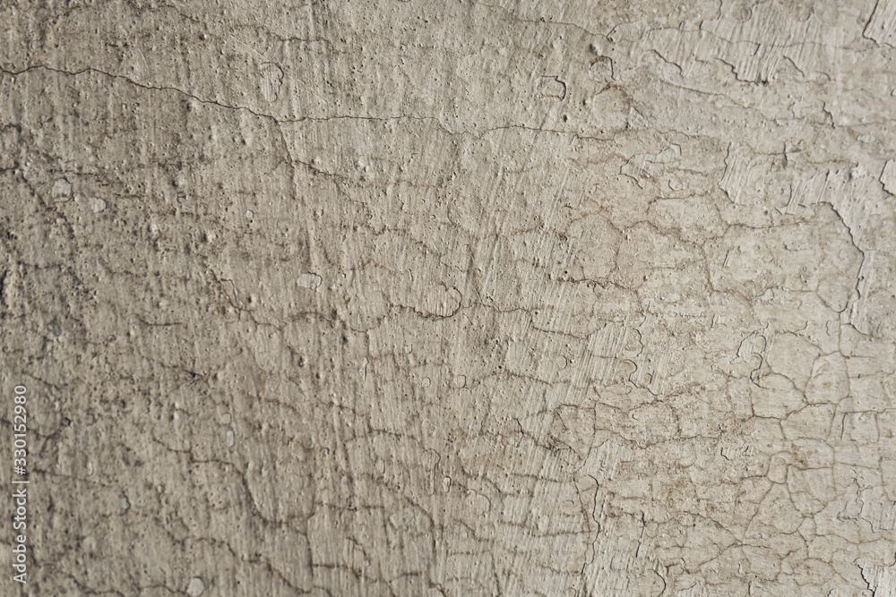 Small cracks on the wall. Grunge background. Smears, stains. Macro Small cracks on the wall. Grunge background. Smears, stains. Macro