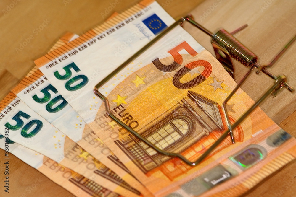 some fifty euro notes trapped in mousetrap