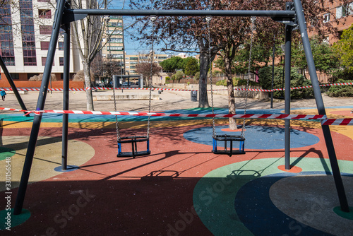 closed and empty children playgrounds in Spain because of coronavirus, covid-19, crisis