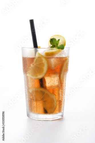 Iced tea drink in glass isolated on white background