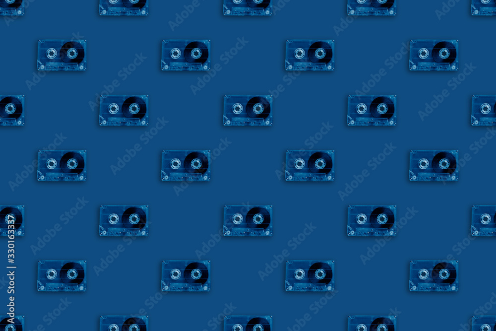 retro transparent audio cassettes seamless pattern colored in trendy classic blue color. vintage music technology retro transparent audio cassettes seamless pattern colored in trendy classic blue color. vintage music technology