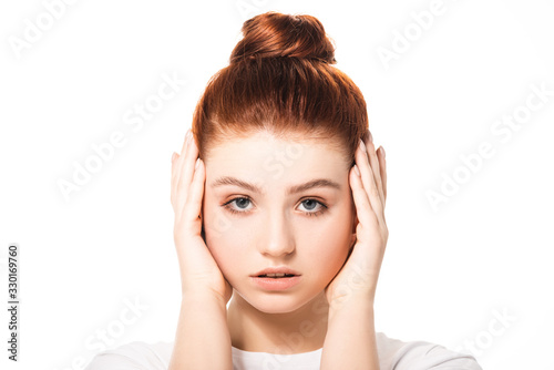 Wallpaper Mural attractive female teenager touching face, isolated on white Torontodigital.ca