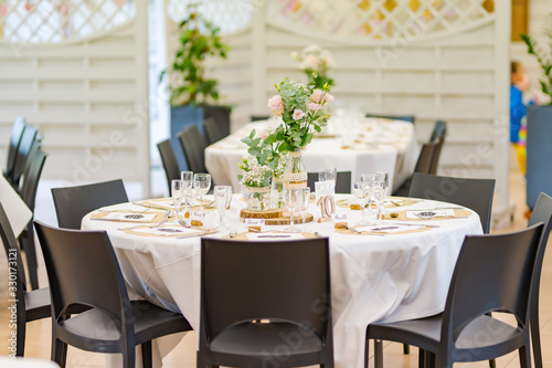 Restaurant table set for a wedding