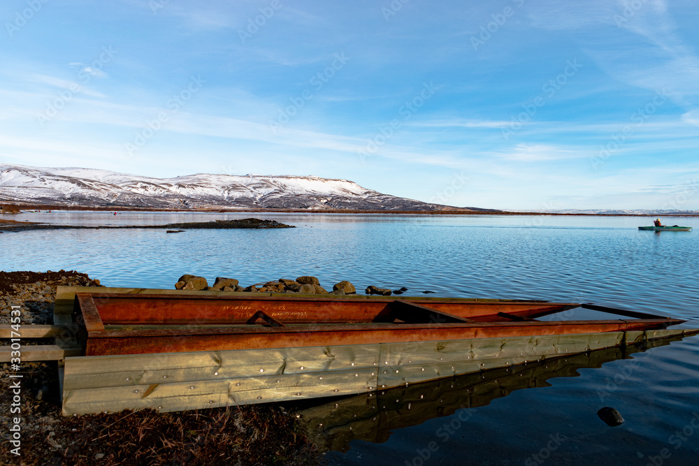Boat near lake in Iceland in winter