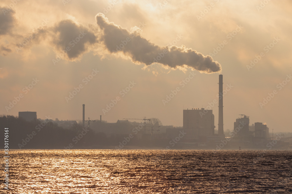 industrial chimney with white smoke , air pollution, environmenal problems
