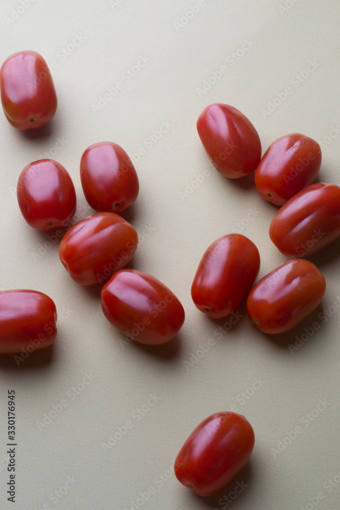 red bright tomatoes on a monotone background red bright tomatoes on a monotone background