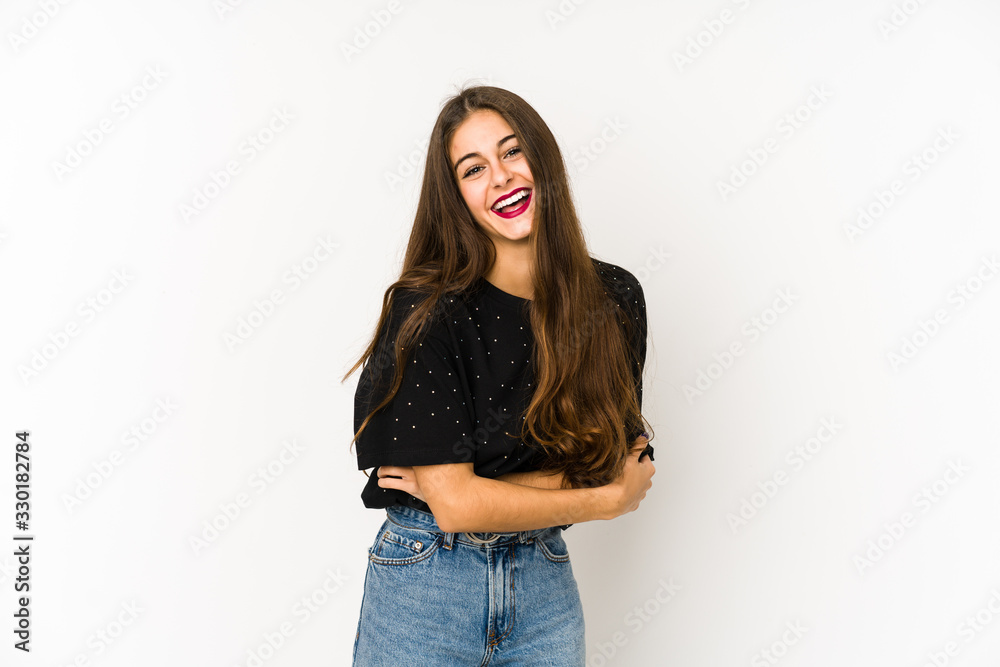 Young caucasian woman isolated on white background laughing and having fun. Young caucasian woman isolated on white background laughing and having fun.