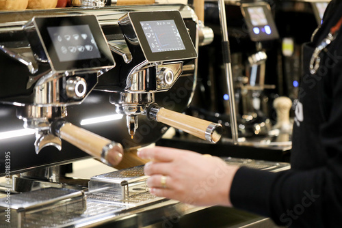 detail of espresso machine making coffee