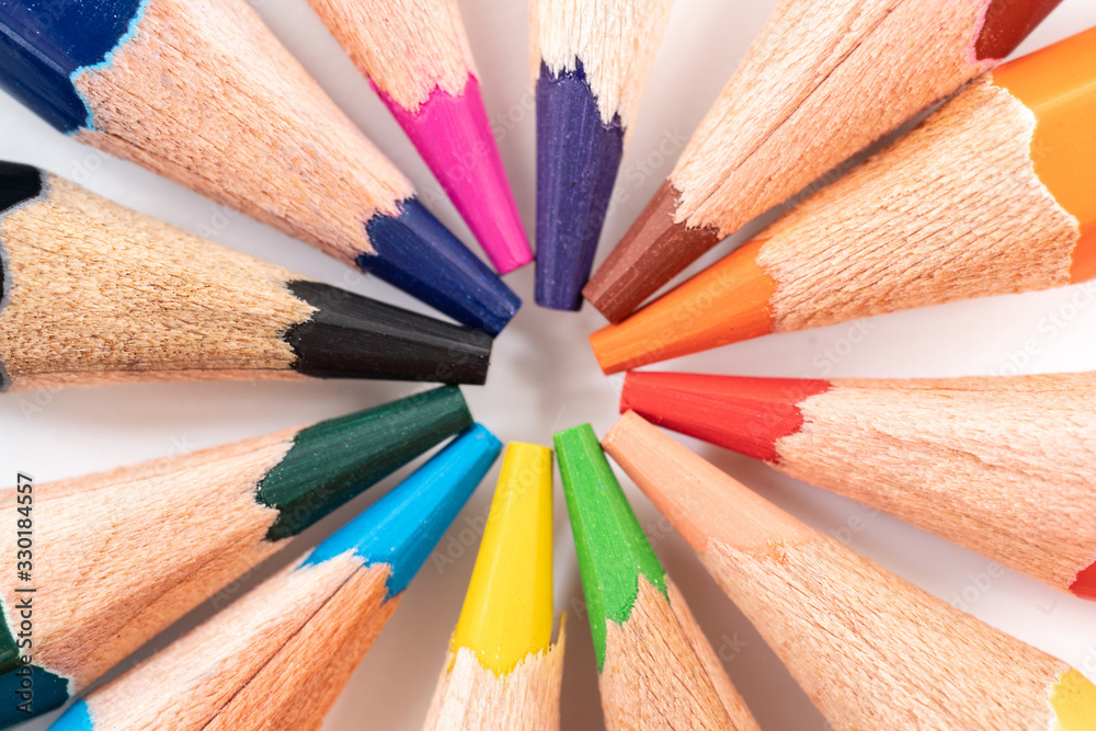 Naklejka premium Colorful wooden pencils isolated on white background
