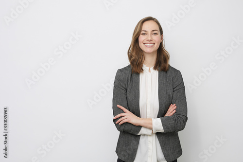 Confident businesswoman smiling at the camera photo