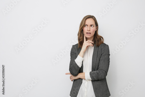 Businesswoman looking considering on what she is going to do