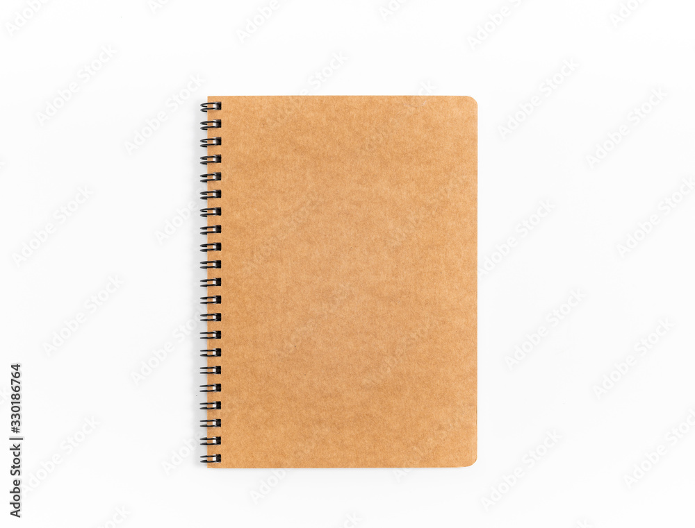 Brown spiral notebook isolated on white background.top view Brown spiral notebook isolated on white background.top view