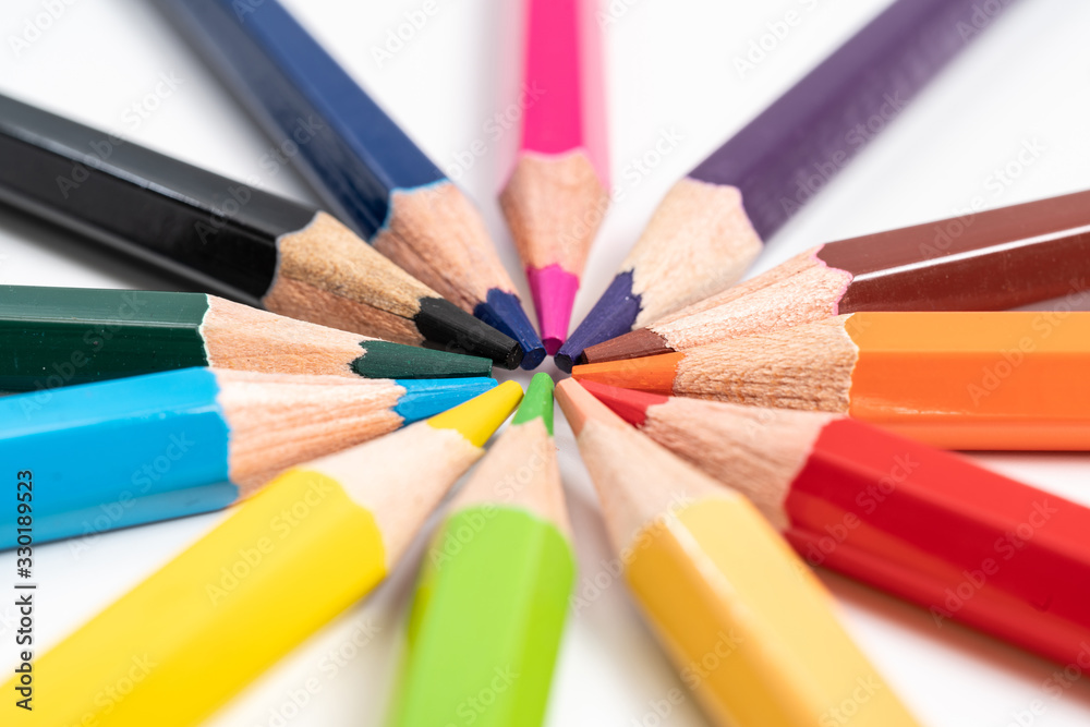Naklejka premium Colorful wooden pencils isolated on white background