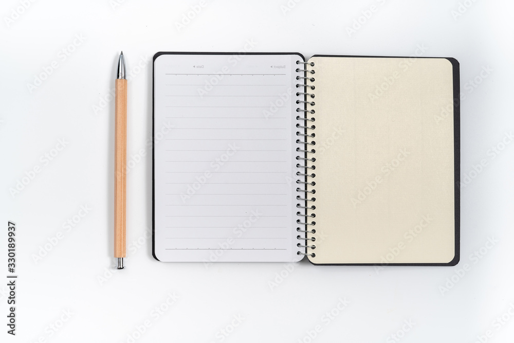 Dark blank blue notebook closed in closeup Dark blank blue notebook closed in closeup