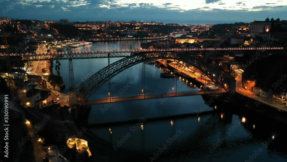 Aerial view illuminated of the Ponte de Dom Luis Bridge at night, Porto, Portugal