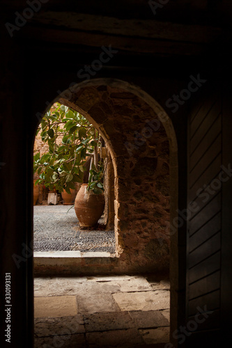 Fragments Toplu monastery courtyard in Crete, Greece.