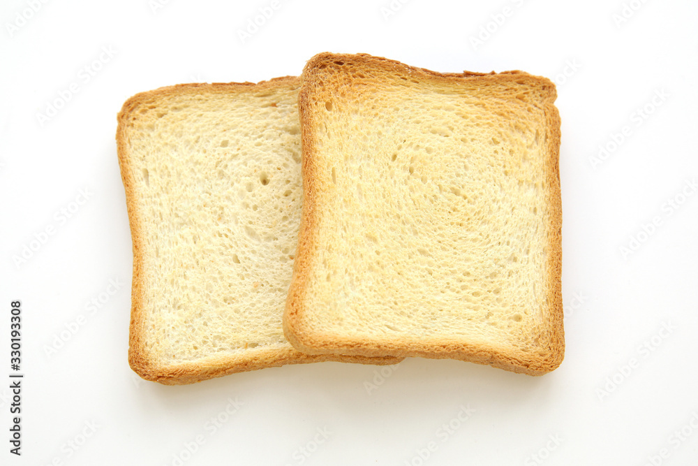 Two slice of bread crust toast isolated on white background. Flat lay. Top view.