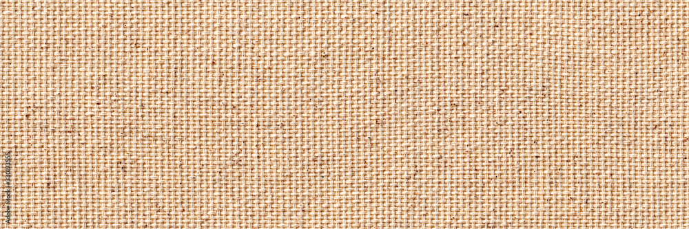 Blank, uncoated canvas or scrim for painting. Long and wide panoramic banner background from rough linen beige cloth or burlap. - obrazy, fototapety, plakaty 