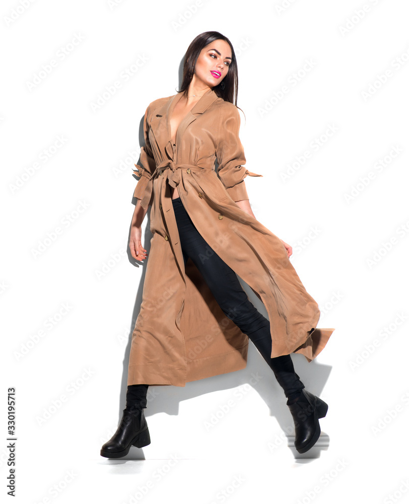 Beauty model girl posing in fashionable spring clothes, wear, apparel. Beautiful young brunette woman in trendy outfit, fashion make up and accessories isolated on white background Urban street style Beauty model girl posing in fashionable spring clothes, wear, apparel. Beautiful young brunette woman in trendy outfit, fashion make up and accessories isolated on white background Urban street style
