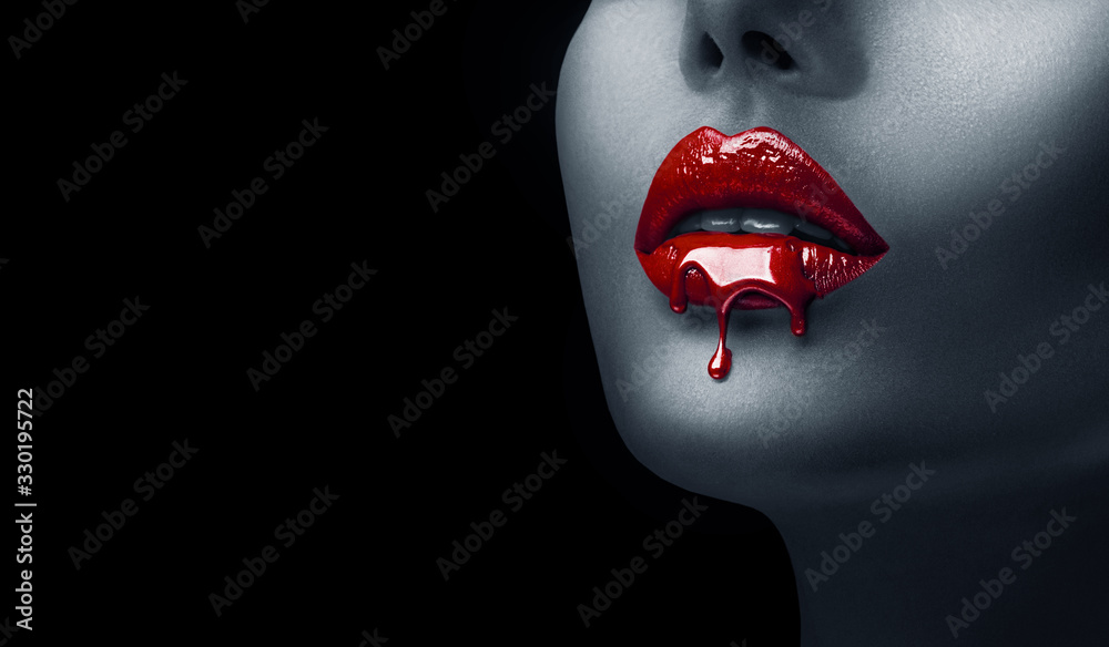 Red Lipstick dripping. Paint drips, lipgloss dripping from sexy lips, Blood liquid drops on beautiful model girl's mouth, creative abstract make-up. Beauty woman face makeup close up, vampire Red Lipstick dripping. Paint drips, lipgloss dripping from sexy lips, Blood liquid drops on beautiful model girl's mouth, creative abstract make-up. Beauty woman face makeup close up, vampire