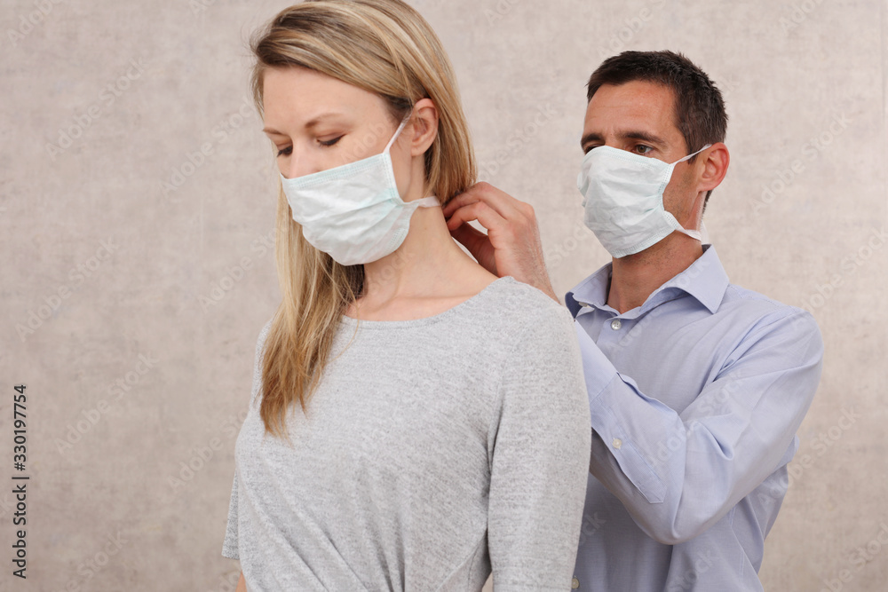 Couple in love wearing hygienic medical mask. New habits, Coronavirus Protection routine, Prevention