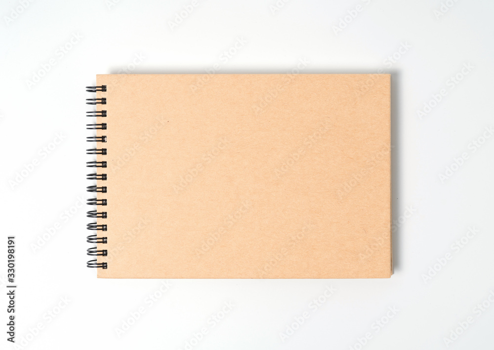 A notebook on a spring. Isolated on white background. A notebook on a spring. Isolated on white background.