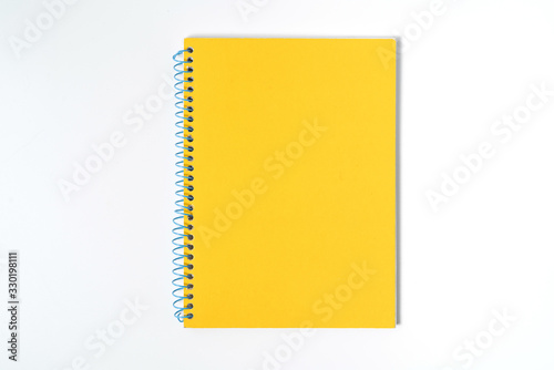 yellow notebook on white background with clipping path - Image