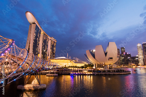 Marina Bay Sands in Singapore at Sunset with bright lights