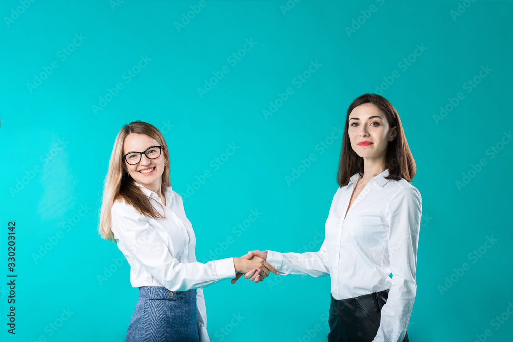 business woman shaking hands, concept close deal or partnership. Two women partners handshaking after signing business contract. Closing the deal. Congrats concept business woman shaking hands, concept close deal or partnership. Two women partners handshaking after signing business contract. Closing the deal. Congrats concept