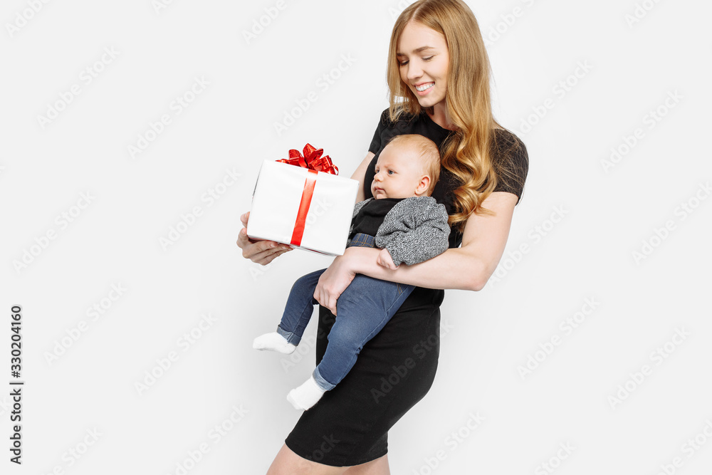 Happy family, mother with a small newborn baby in her arms Happy family, mother with a small newborn baby in her arms