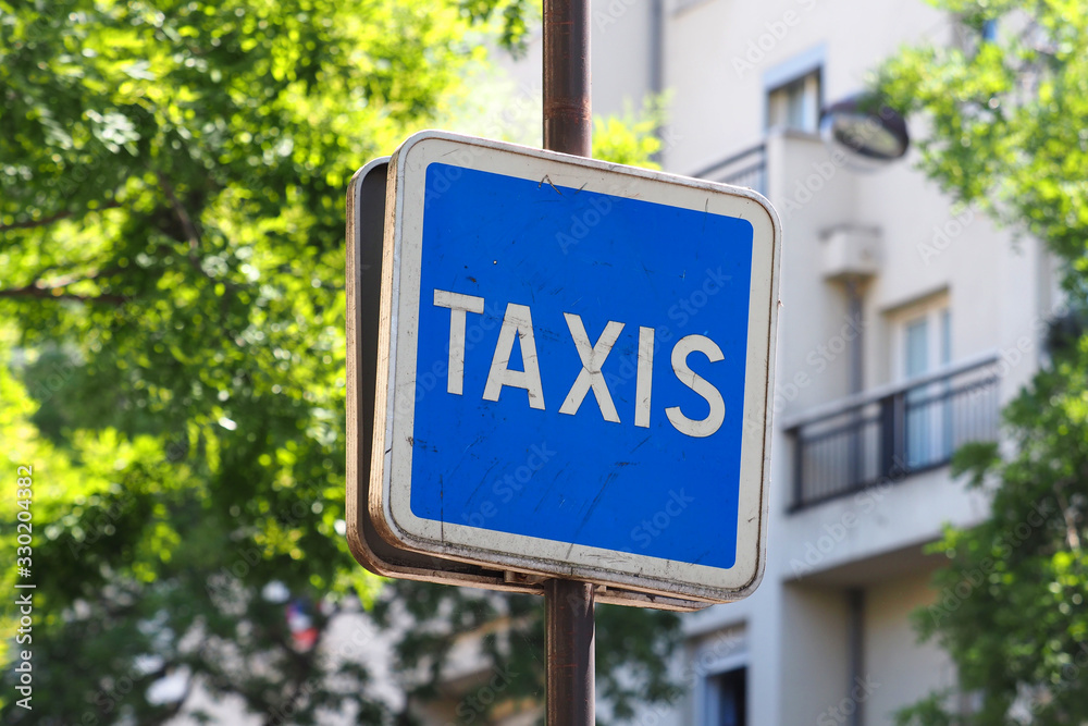 Paris, France. Road sign showing the Parisian taxi station
