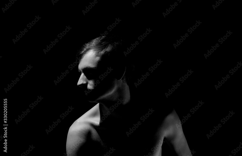expressive photo, black and white portrait of a guy, with hard light