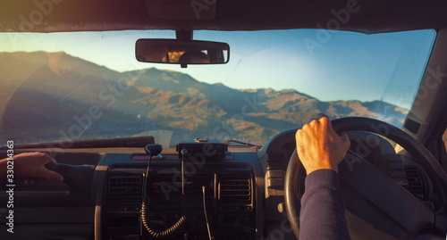 Off-road driving, view from inside the car through the windshield