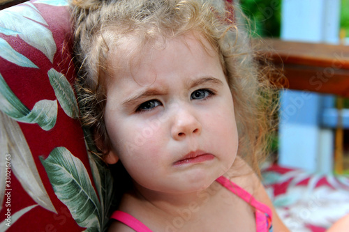 Fotografi Crabby and Fussy Little Girl on Front Porch
