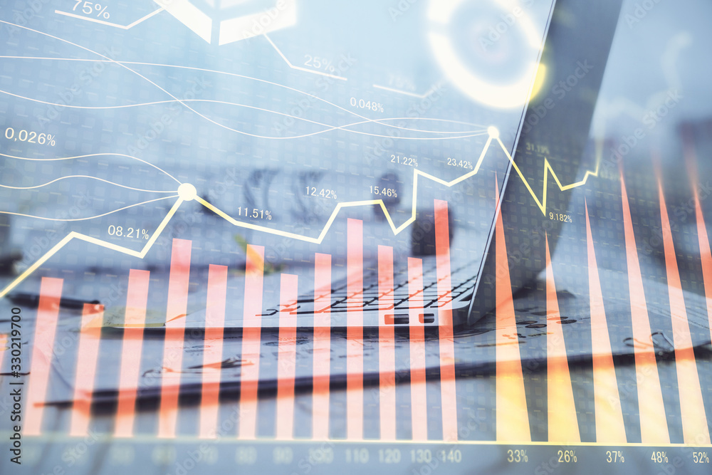 Stock market graph on background with desk and personal computer. Multi exposure. Concept of financial analysis. Stock market graph on background with desk and personal computer. Multi exposure. Concept of financial analysis.