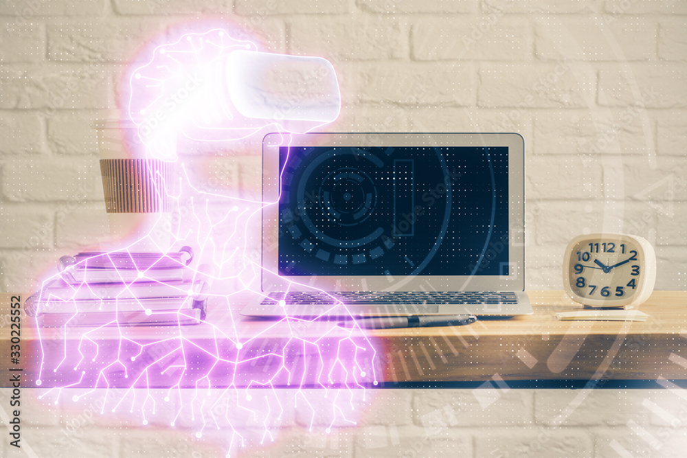 Computer on desktop with AR theme icon. Multi exposure. Concept of augmented reality. Computer on desktop with AR theme icon. Multi exposure. Concept of augmented reality.
