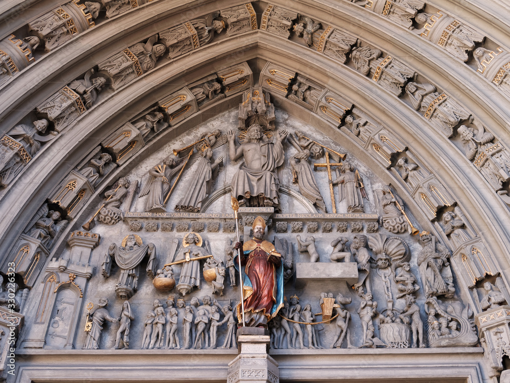 Tympanum of the St-Nicolas cathedral in the city of Fribourg, Switzerland showing the scene of the Last Judgment.