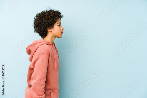 African american little boy isolated gazing left, sideways pose. photo