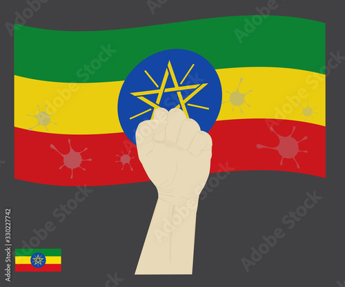 Fist power hand with novel coronavirus or COVID-19 virus stained on the Athiopia National Flag, Fight for Athiopian people concept, sign symbol background, vector illustration. photo