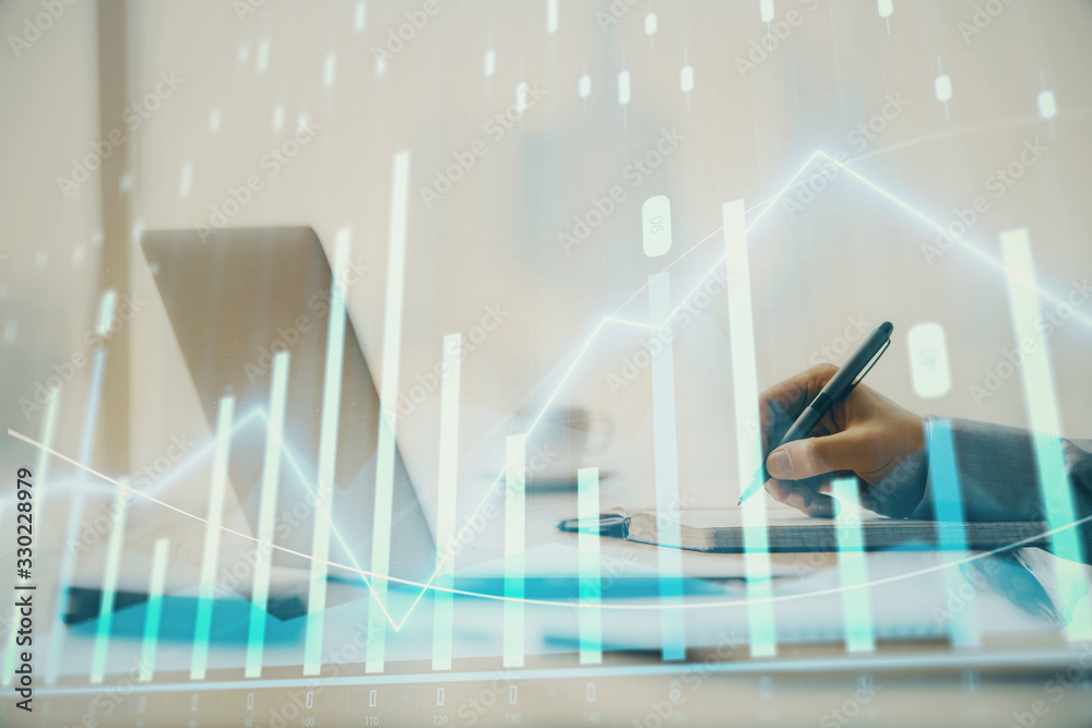 Double exposure of forex chart with man working on computer on background. Concept of market analysis. Double exposure of forex chart with man working on computer on background. Concept of market analysis.