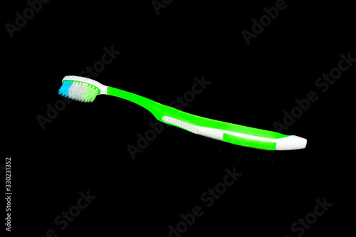 toothbrush on a black background