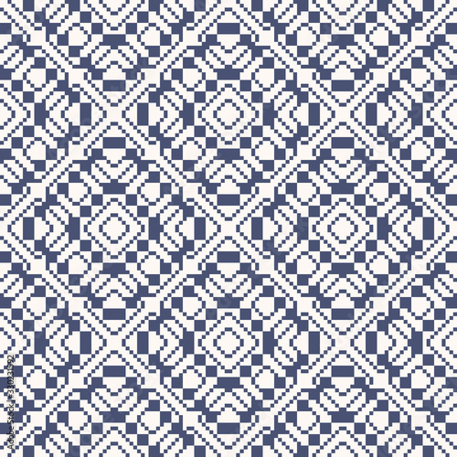 Vector geometric traditional folk ornament. Ethnic seamless pattern. Ornamental background with small squares, crosses, snowflakes, floral shapes. Texture of embroidery, knitting. White and blue color